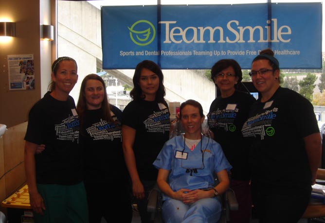 Dr. Miller and Team Volunteer at TeamSmile