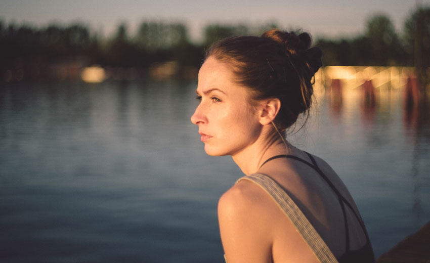 girl with sensitive teeth looking away