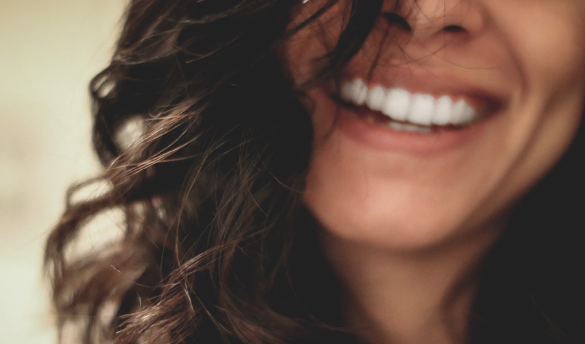 woman's smile from dental porcelain veneers