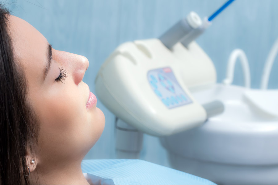 woman under dental sedation awaiting a dental procedure